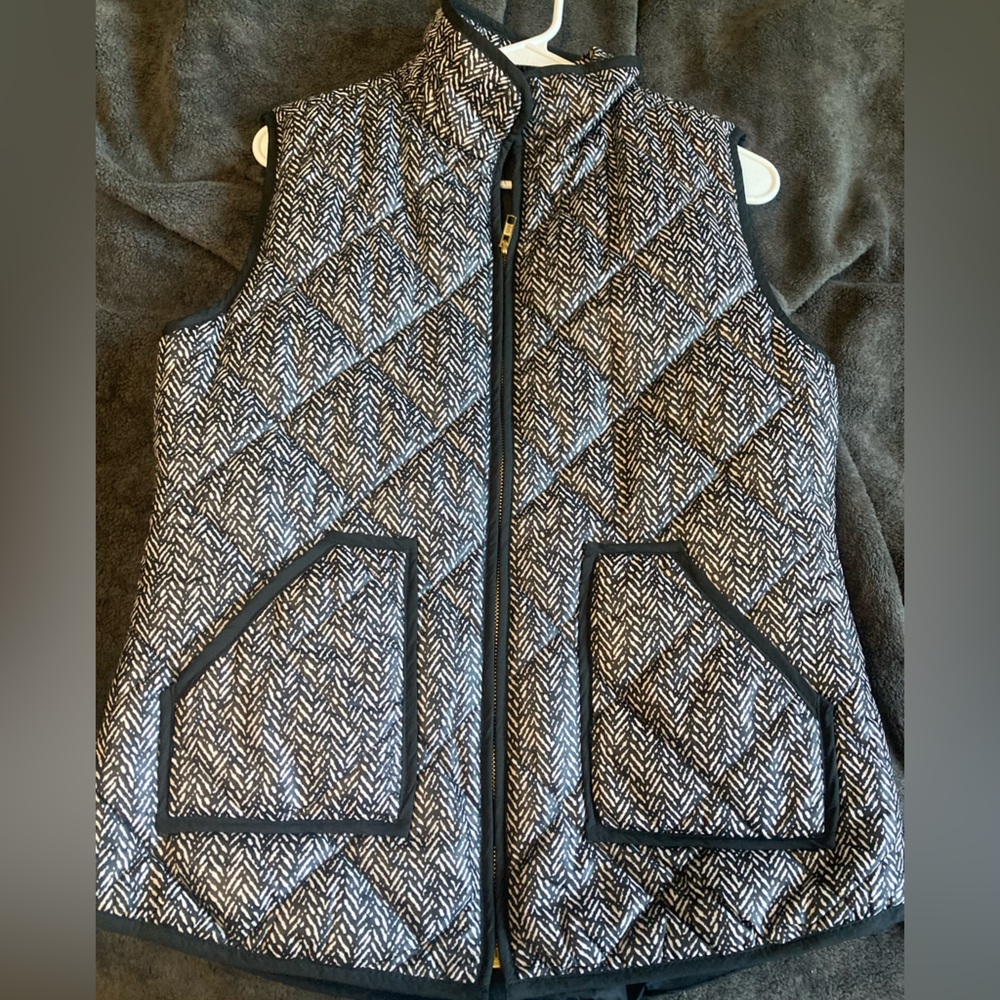 Black and white vest